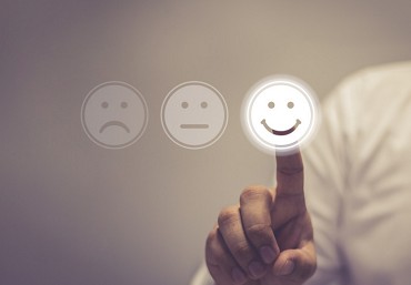 Drei Emojis, traurig, neutral, fr&ouml;hlich
